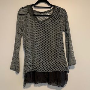A cute dark grey long sleeve with a detached camisole to go with it underneath!
